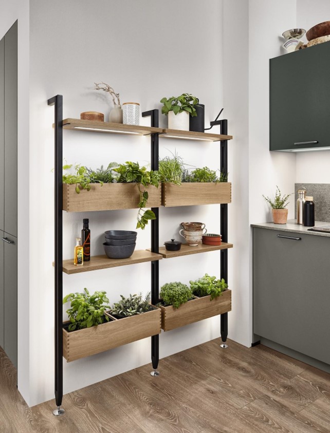 A vertical herb garden integrated into an eco kitchen design, promoting sustainable living and fresh ingredients within easy reach.