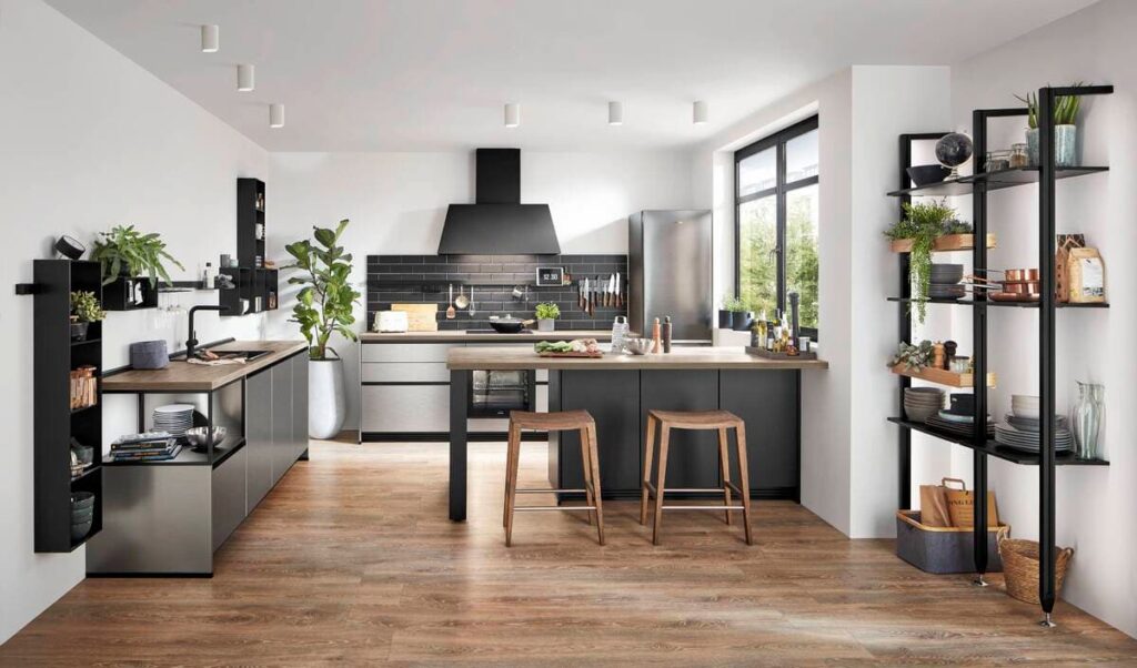 An industrial-style kitchen showcasing built-in storage and shelving, maximizing functionality and maintaining a clean aesthetic.