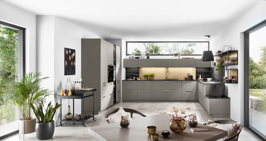 Contemporary kitchen top idea with an open-concept layout featuring neutral tones and integrated lighting.