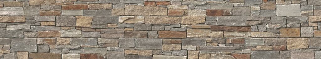 Unique kitchen top idea with a rustic stone backsplash complementing earthy countertop designs.