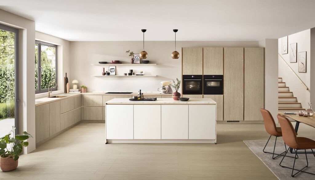 Minimalist kitchen design with warm wooden cabinetry and a central island for preparation and storage.